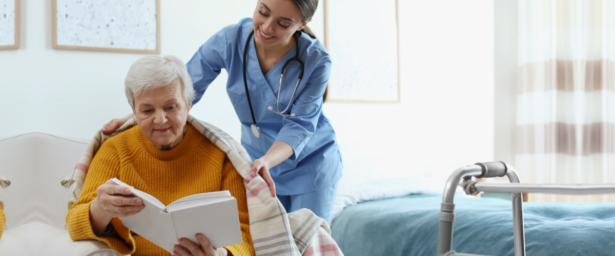 caregiver taking care of senior woman