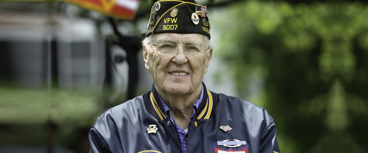 a veteran smiling at the camera